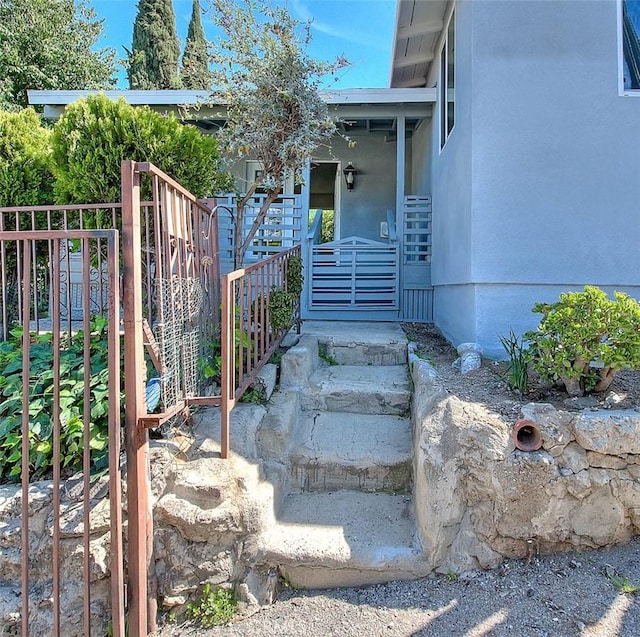 4026 Toland Way, Los Angeles, CA 90065 - view of exterior entry with stucco siding and fence