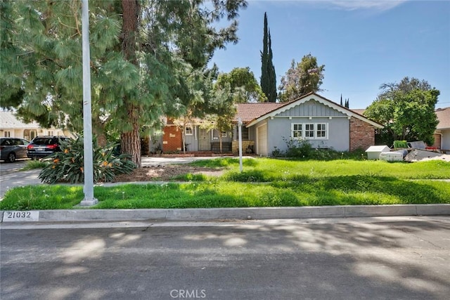21032 Baltar St, Canoga Park, CA 91304 - view of front facade featuring a front yard