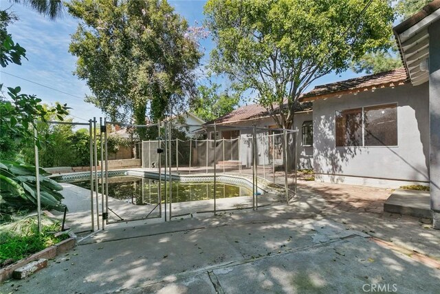 21032 Baltar St, Canoga Park, CA 91304 - exterior space featuring fence, a pool, and a patio area