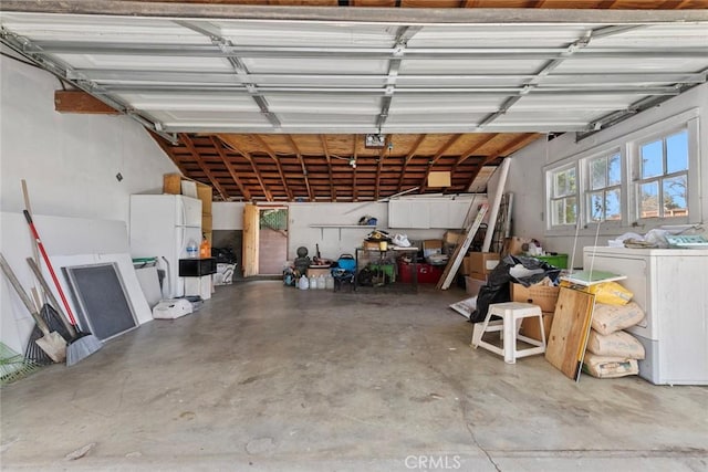21032 Baltar St, Canoga Park, CA 91304 - garage featuring freestanding refrigerator and washer / clothes dryer