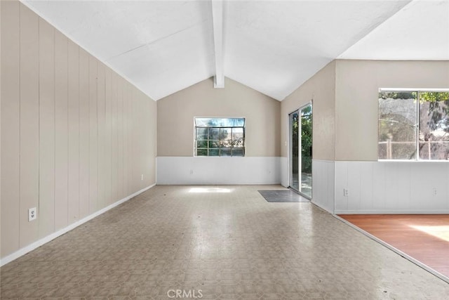 21032 Baltar St, Canoga Park, CA 91304 - spare room with lofted ceiling with beams