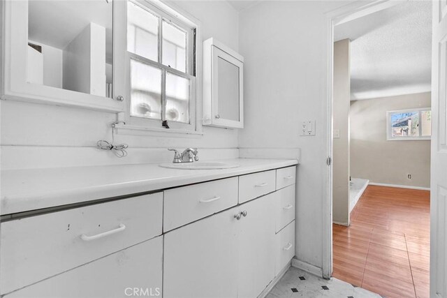 21032 Baltar St, Canoga Park, CA 91304 - bathroom featuring vanity and baseboards