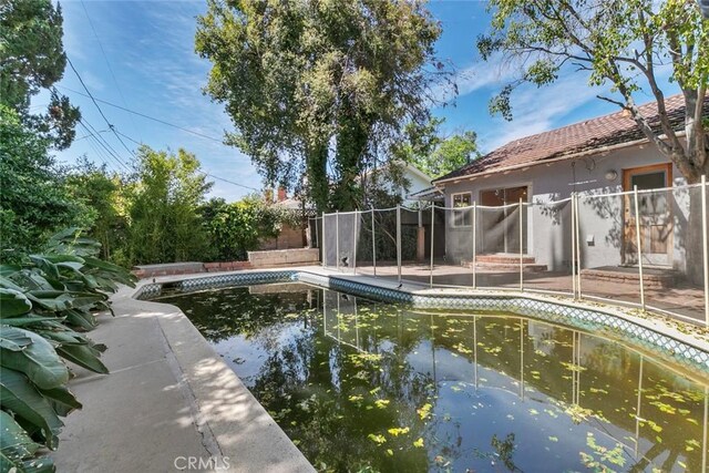 21032 Baltar St, Canoga Park, CA 91304 - view of pool with a fenced in pool and fence