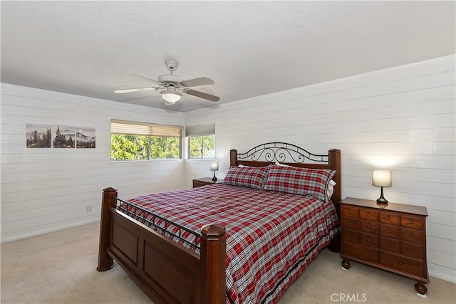 279 Bluebird Ct, Big Bear Lake, CA 92315 - bedroom featuring light carpet, ceiling fan, and a textured ceiling