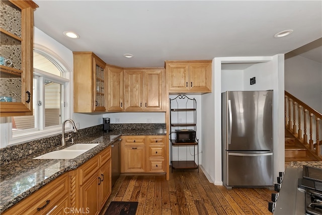 279 Bluebird Ct, Big Bear Lake, CA 92315 - kitchen with dark stone counters, stainless steel appliances, dark wood-type flooring, glass insert cabinets, and a sink