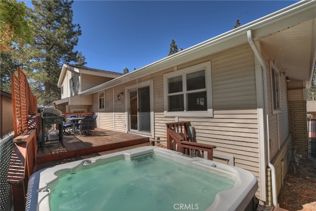 279 Bluebird Ct, Big Bear Lake, CA 92315 - rear view of property with a deck and a hot tub