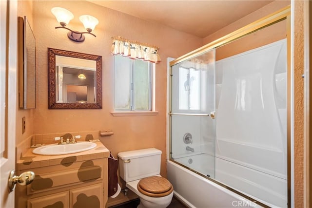 14935 Elizabeth Lake Rd, Lake Elizabeth, CA 93532 - bathroom with toilet, vanity, and bath / shower combo with glass door