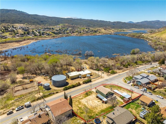 14935 Elizabeth Lake Rd, Lake Elizabeth, CA 93532 - drone / aerial view featuring a water and mountain view