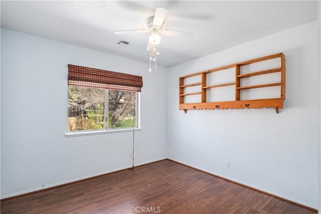 14935 Elizabeth Lake Rd, Lake Elizabeth, CA 93532 - spare room with wood finished floors, baseboards, ceiling fan, and visible vents