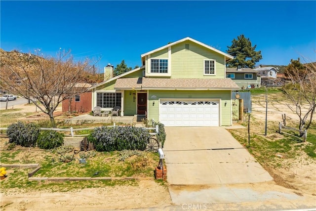 14935 Elizabeth Lake Rd, Lake Elizabeth, CA 93532 - traditional-style home with concrete driveway, roof with shingles, fence, a garage, and a chimney