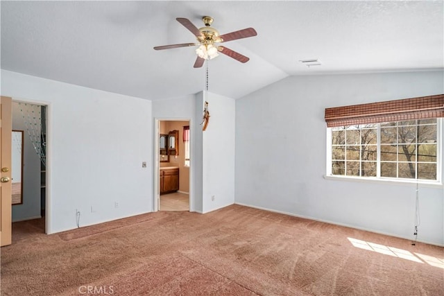 14935 Elizabeth Lake Rd, Lake Elizabeth, CA 93532 - unfurnished bedroom with ensuite bathroom, vaulted ceiling, a spacious closet, and carpet