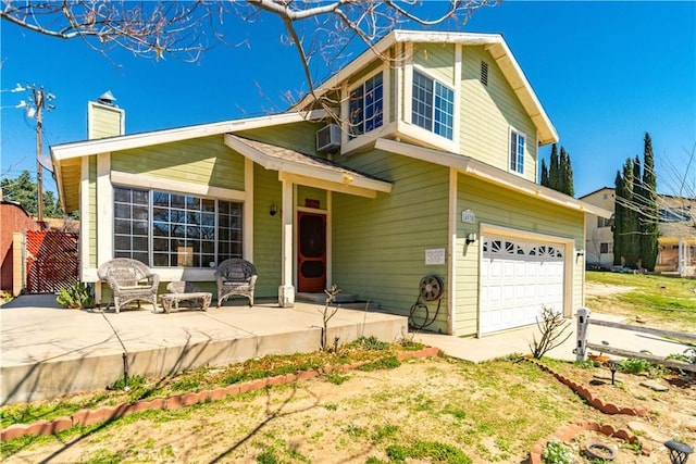 14935 Elizabeth Lake Rd, Lake Elizabeth, CA 93532 - traditional-style house featuring a chimney and a garage