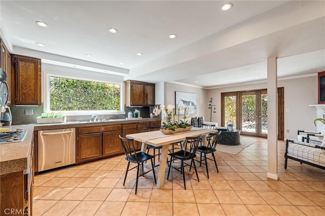 kitchen with stainless steel appliances, recessed lighting, and a healthy amount of sunlight