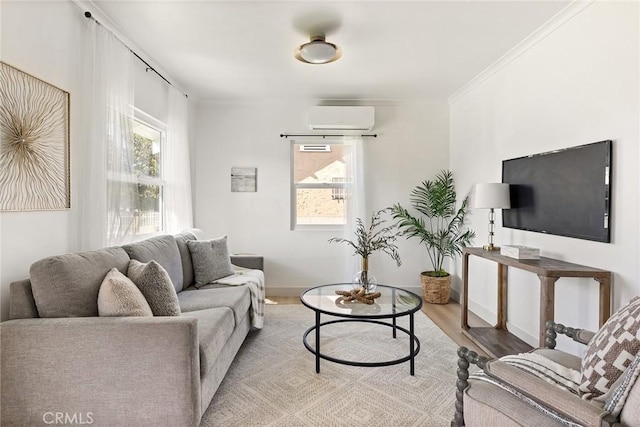 living area featuring crown molding, baseboards, a wall mounted AC, and wood finished floors