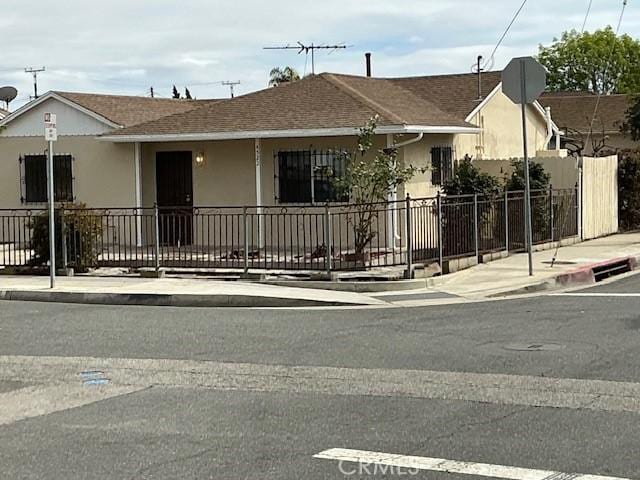 4522 W 156th St, Lawndale, CA 90260 - view of front facade featuring stucco siding and roof with shingles