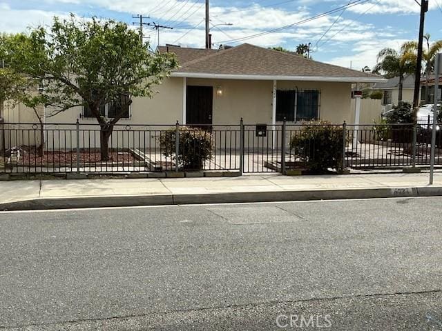4522 W 156th St, Lawndale, CA 90260 - view of front of house featuring stucco siding and roof with shingles