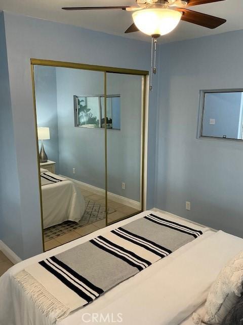 4522 W 156th St, Lawndale, CA 90260 - bedroom with a closet, ceiling fan, and baseboards
