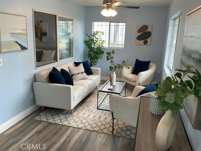 4522 W 156th St, Lawndale, CA 90260 - living area with wood finished floors, baseboards, and a ceiling fan