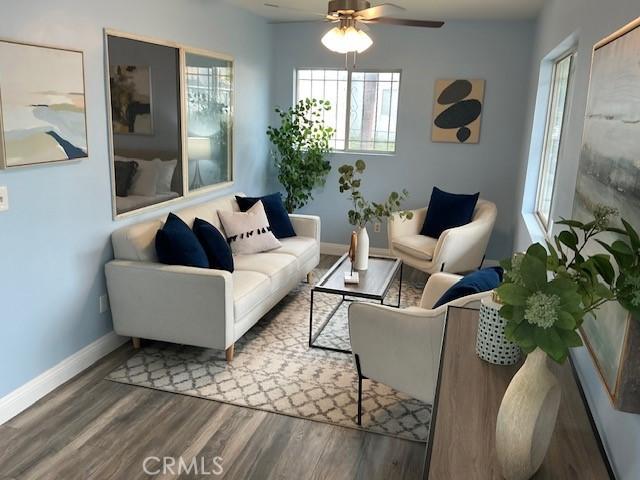 4522 W 156th St, Lawndale, CA 90260 - living area with wood finished floors and a ceiling fan