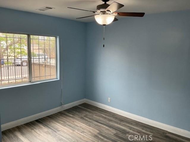 4522 W 156th St, Lawndale, CA 90260 - spare room featuring a ceiling fan, wood finished floors, and baseboards