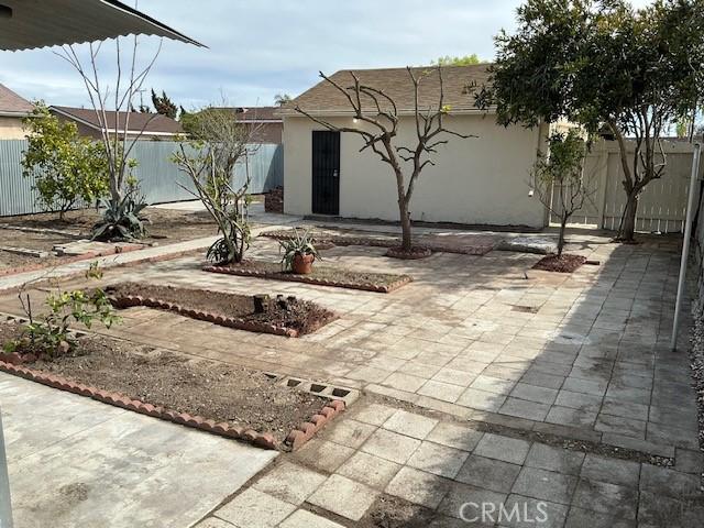 4522 W 156th St, Lawndale, CA 90260 - fenced backyard with a patio area
