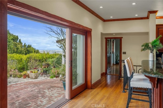 2501 Novato Pl, Palos Verdes Estates, CA 90274 - entryway featuring healthy amount of natural light, crown molding, light wood finished floors, recessed lighting, and baseboards
