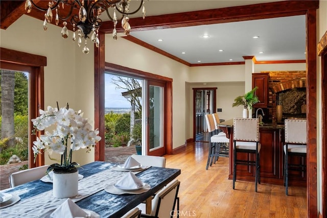 2501 Novato Pl, Palos Verdes Estates, CA 90274 - dining space featuring a chandelier, light wood-type flooring, crown molding, recessed lighting, and baseboards