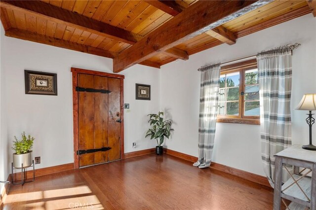 2501 Novato Pl, Palos Verdes Estates, CA 90274 - entrance foyer with wood finished floors, wood ceiling with exposed beams, and baseboards