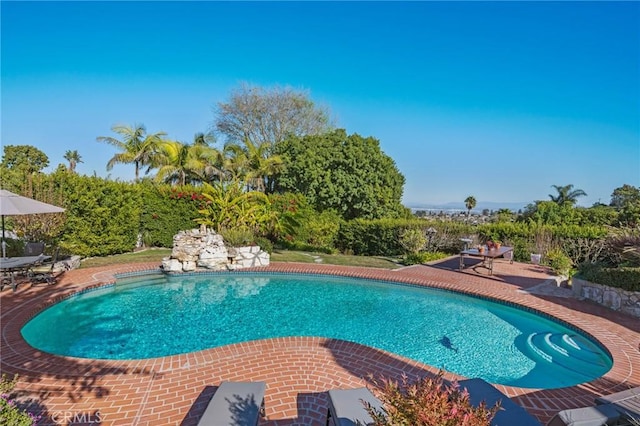 pool featuring a patio