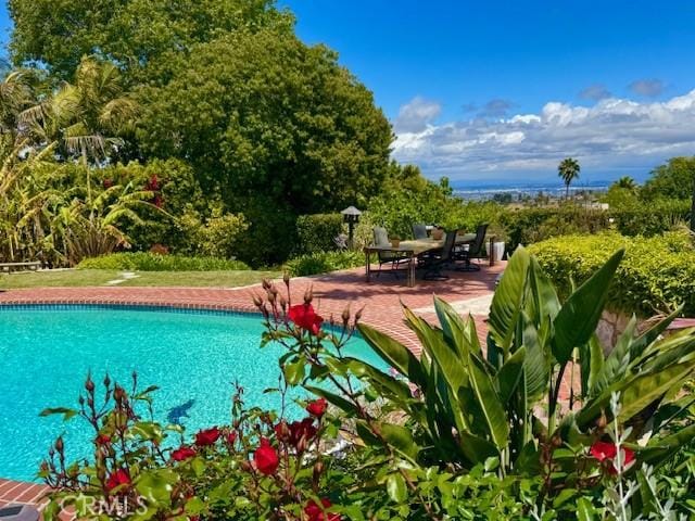 pool with a patio