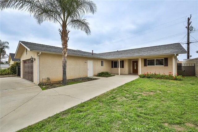 5420 Chiquita Ln, San Bernardino, CA 92404 - single story home featuring stucco siding, driveway, and a garage