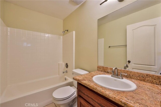full bath featuring toilet, vanity, and shower / bath combination