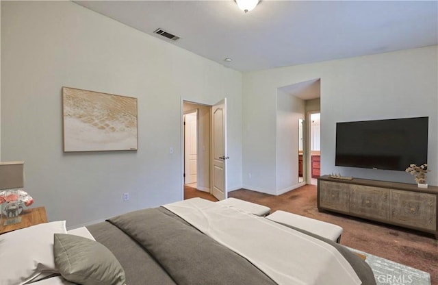 5420 Chiquita Ln, San Bernardino, CA 92404 - carpeted bedroom with baseboards and connected bathroom