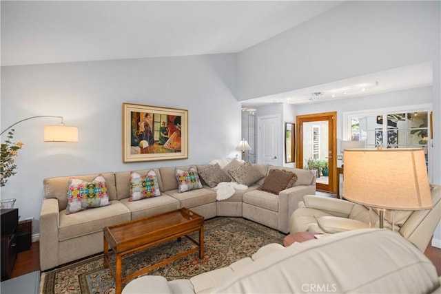 22876 Montalvo Rd, Laguna Niguel, CA 92677 - living area featuring vaulted ceiling, wood finished floors, and baseboards