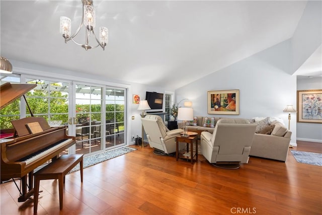 22876 Montalvo Rd, Laguna Niguel, CA 92677 - living area featuring lofted ceiling, wood finished floors, a chandelier, and baseboards