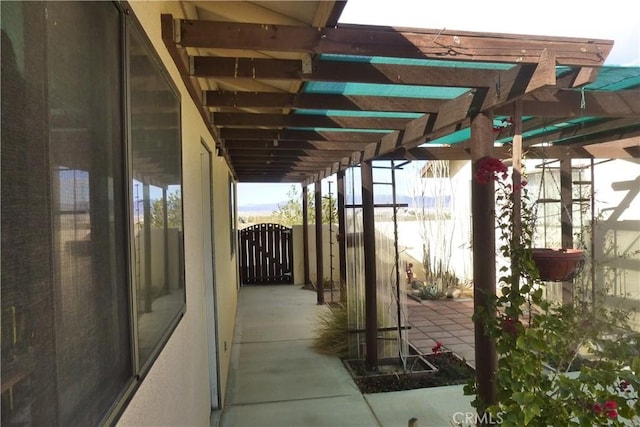 view of patio / terrace with a gate