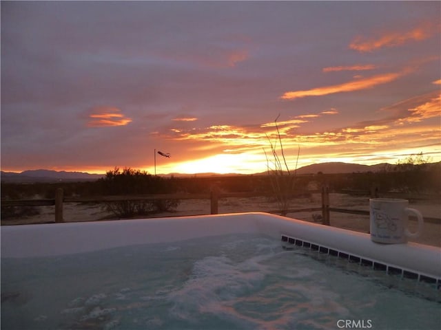 view of pool with a mountain view