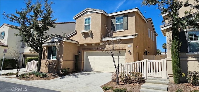 5232 Las Palmas Way, Chino, CA 91710 - view of property featuring stucco siding, an attached garage, and concrete driveway