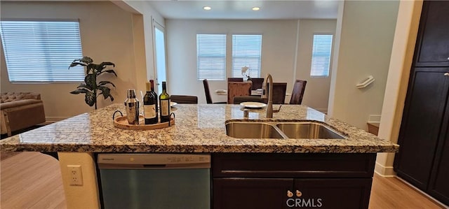 5232 Las Palmas Way, Chino, CA 91710 - kitchen featuring stainless steel dishwasher, a sink, a kitchen island with sink, light wood-type flooring, and open floor plan