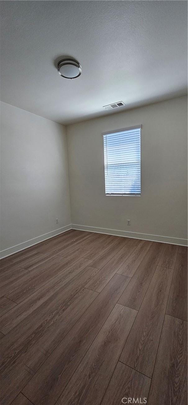 5232 Las Palmas Way, Chino, CA 91710 - unfurnished room featuring dark wood-type flooring and baseboards
