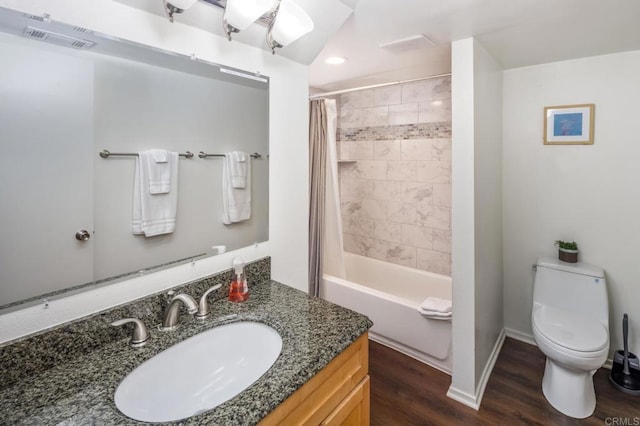 303305 Sanford St, Encinitas, CA 92024 - full bath featuring wood finished floors, toilet, vanity, recessed lighting, and shower / tub combo