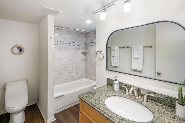 303305 Sanford St, Encinitas, CA 92024 - bathroom with wood finished floors, toilet, vanity, recessed lighting, and shower / bath combination