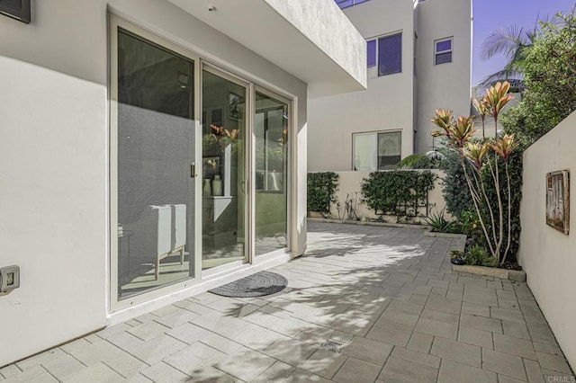 view of patio featuring fence
