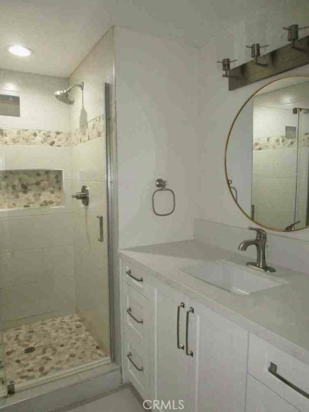 340 Foxenwood Dr, Santa Maria, CA 93455 - full bathroom featuring a shower stall and vanity