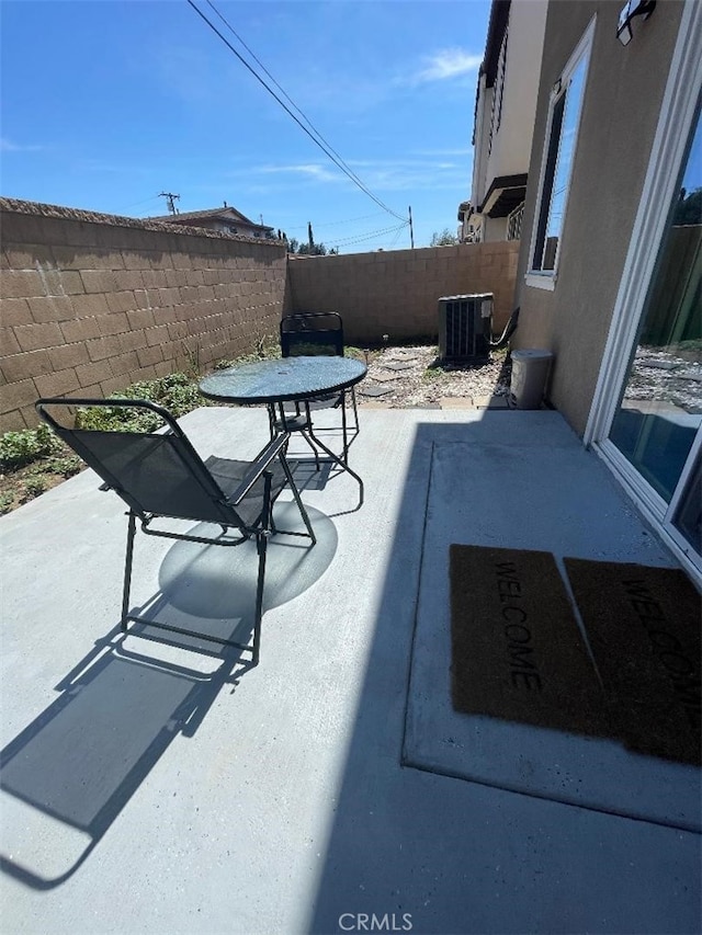 1406 Girona Dr, Pomona, CA 91766 - view of patio featuring cooling unit and fence