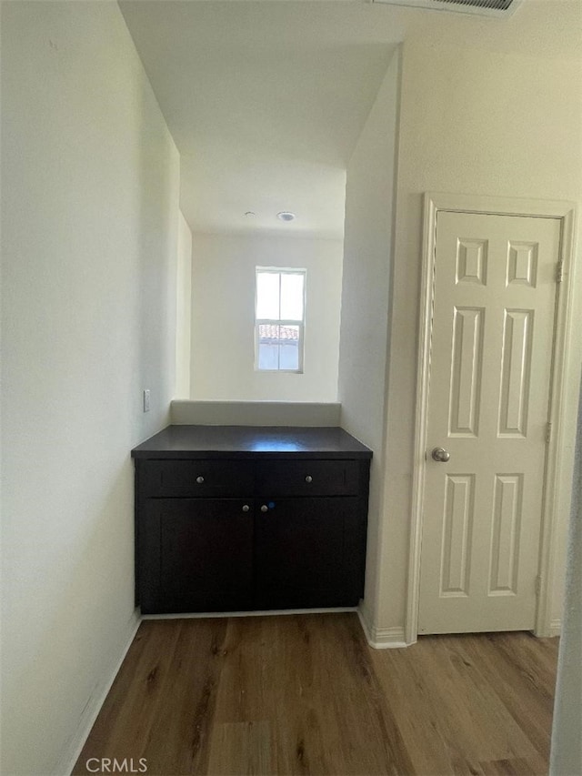 1406 Girona Dr, Pomona, CA 91766 - corridor with baseboards and wood finished floors