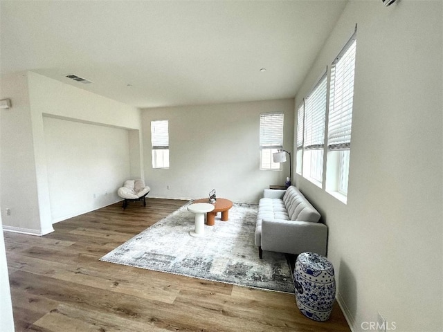 1406 Girona Dr, Pomona, CA 91766 - living room with visible vents and wood finished floors