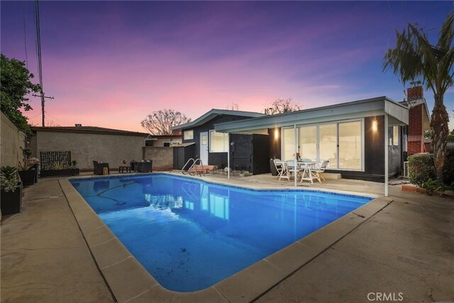 2902 Ladoga Ave, Long Beach, CA 90815 - swimming pool featuring a patio area