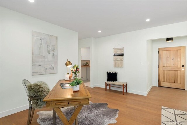 2902 Ladoga Ave, Long Beach, CA 90815 - living room featuring baseboards, light wood finished floors, and recessed lighting