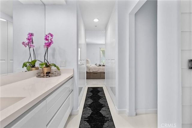 2233 Martin Unit 212, Irvine, CA 92612 - ensuite bathroom featuring vanity, recessed lighting, and connected bathroom